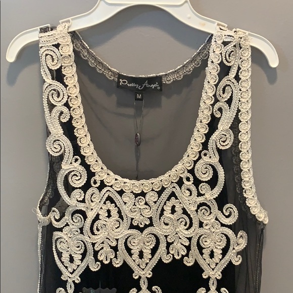 Black sleeveless dress with white stitching - Picture 3 of 7